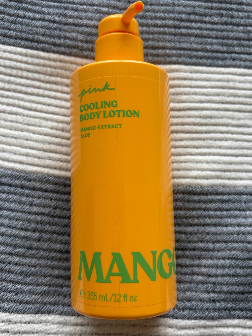 Victoria's Secret PINK Cooling Mango Body Lotion - Bright Orange with Green Text